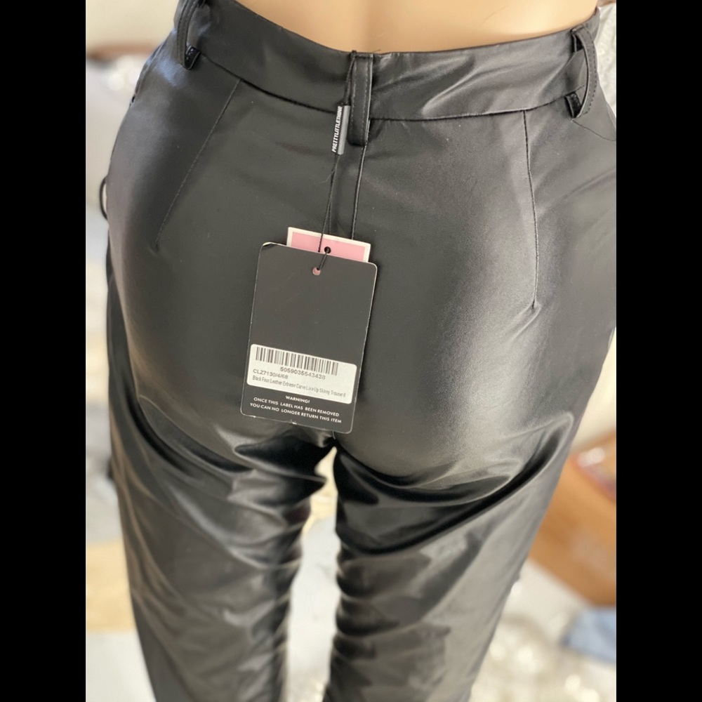 Lace up faux leather pants